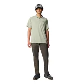 Remera polo de manga corta de la marca Columbia, color verde, con cierre frontal de tres botones y logo bordado en el pecho.