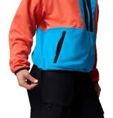 Campera polar Columbia de la colección Icons, con diseño color block en tonos naranja, azul y negro. Presenta cierre frontal completo, cuello alto, bolsillos laterales con cierre y detalles en nailon en el pecho.