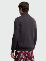 Campera híbrida Moncler con frente acolchado de nylon y mangas y espalda de tejido de punto. Presenta cuello alto, cierre frontal completo y logo de la marca en el pecho.