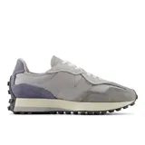 Championes New Balance 327 unisex, color gris con detalles en celeste y suela color crema.