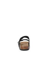 Sandalias estilo Birkenstock color negro con dos tiras ajustables con hebillas metálicas, plantilla anatómica con reborde de corcho y suela de goma.