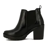 Bota tipo Chelsea de cuero negro con paneles elásticos laterales, taco cuadrado y suela con plataforma dentada.