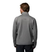 Campera polar Columbia Titanium de cuello alto y cierre frontal completo. Presenta un bolsillo en el pecho con cierre y panel de tela tejida, mangas largas con orificios para pulgares en los puños y ribetes elásticos en puños y dobladillo. Confeccionada con tecnología Omni-Wick para gestión de la humedad.