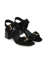 Sandalias de taco ancho negro en nobuck, con tiras en la capellada y en el talón ajustables mediante hebillas metálicas doradas.