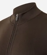 Campera deportiva Get Over de corte ajustado, color marrón, confeccionada en poliamida y elastano con textura acanalada, cuello alto y cierre frontal por cremallera.