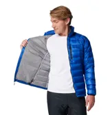 Campera puffer de alto rendimiento Columbia Titanium, diseñada para actividades al aire libre. Presenta un diseño acolchado con aislamiento de plumón de ganso de 700 fill power, tecnología Omni-Heat Arctic para retención de calor y acabado Omni-Shield repelente al agua y manchas. Incluye cierre frontal completo, cuello alto con mentonera, bolsillos laterales y en el pecho con cierre, y dobladillo ajustable.