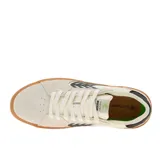 Championes urbanos Cariuma modelo Catiba Pro 2.0, color blanco con detalles en negro. Presentan una estructura de lona y gamuza con suela de goma color caramelo y logo lateral característico.