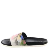 Chanclas Adidas Comfort para mujer, con base negra y tira superior estampada con flores y logo de Adidas en rosa.