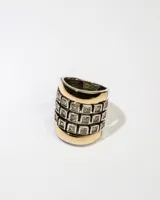 Anillo ancho de plata 925 con dublé de oro y tres filas de zirconias blancas cuadradas.