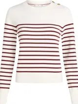 Sweater de punto con diseño de rayas horizontales, cuello redondo y manga larga. Presenta botones decorativos en tono dorado sobre uno de los hombros y puños acanalados.