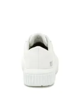 Sneaker de plataforma Cat modelo Amp, color blanco, con capellada de canvas recubierta en PU y suela de goma con tracción.