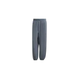Pantalón de jogging Adidas Soft Lux de color gris, con cintura elástica y puños ajustados en los tobillos. Cuenta con el logo de la marca sutilmente bordado en la pierna izquierda.