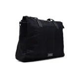 Bolso tipo shopper negro con doble asa de hombro y cierre superior.