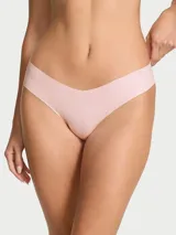 Panty tipo colaless de algodón elástico en color rosado melange, con diseño de talle bajo y bordes sin costuras para un acabado invisible bajo la ropa.