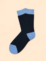 Medias de algodón con diseño de micro puntos, en color azul marino con detalles en celeste en el talón, puntera y puño.