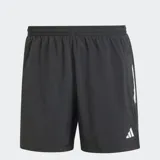 Short de running Adidas modelo Own The Run, color negro. Confeccionado en tejido técnico con tecnología AEROREADY para absorción de humedad, cuenta con cintura elástica con cordón ajustable, bolsillos frontales con cierre y detalles reflectantes.