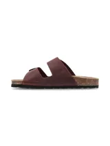 Sandalias tipo Birkenstock de cuero color bordó, con dos tiras ajustables con hebillas metálicas envejecidas, plantilla anatómica de corcho y suela de goma negra.