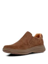 Zapatos slip-on Hush Puppies modelo Hunt II de color marrón, con capellada de cuero, suela ultraliviana y flexible con tecnología Zero G y paneles elásticos laterales para un calce cómodo.
