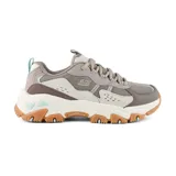 Championes Skechers D'Lites Hiker color topo, con detalles en marrón y celeste. Capellada de malla con refuerzos de cuero y material sintético. Plantilla Skechers Air-Cooled Memory Foam y suela de goma Goodyear.