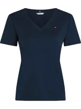 Remera de manga corta, color azul marino, con cuello en V y corte ajustado al cuerpo. Presenta el logo de Tommy Hilfiger bordado en el pecho.