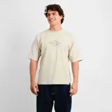 Remera O'Neill Legacy Icon de corte oversize, color beige, con cuello redondo y diseño gráfico minimalista en el centro del pecho.