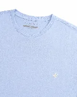 Remera Brooksfield de algodón pima color verde militar, de manga corta y cuello redondo, con pequeño logo bordado en el pecho.