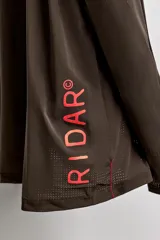 Camiseta deportiva de manga larga Zara Athleticz en colaboración con Ridar, color marrón, con tejido ligero perforado de secado rápido, cuello redondo y detalles de logos estampados.