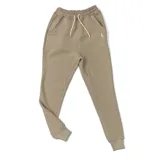 Pantalón de jogging color tostado con cintura elástica ajustable con cordón, bolsillos laterales y puños en los tobillos.