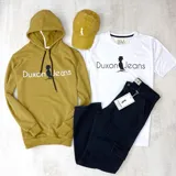 Canguro mostaza de algodón sin felpa, con capucha y cordones negros. Estampa frontal con el logo de la marca Duxon Jeans en blanco y negro.