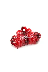 Broche para el pelo tipo clip con diseño de flores en color rojo translúcido.