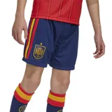Short de fútbol Adidas de la selección española, modelo primera equipación 2026. Diseño azul con detalles en rojo y amarillo.