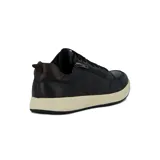 Zapato acordonado de cuero negro con cierre lateral y suela color crema.