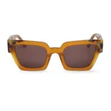 Lentes de sol Mr Boho modelo Frelard, con montura color caramelo y detalles carey en los extremos.