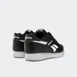 Championes Reebok modelo Jogger Lite, color negro con detalles en blanco y suela blanca, de diseño clásico y deportivo.