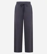Pantalón de jogging marrón de algodón con forro de polar, corte amplio tipo barrel, cintura elástica con cordón de ajuste y bolsillos laterales.