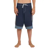 Boardshort de baño Billabong modelo Spec Systems Pro, de corte largo en color azul marino con paneles laterales en tonos celestes y grises, y cordón ajustable blanco en la cintura.