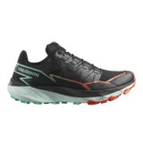 Championes de trail running Salomon Thundercross, color negro con suela verde menta y detalles en naranja. Cuentan con tacos agresivos de 5 mm, amortiguación dinámica y sistema de ajuste preciso.