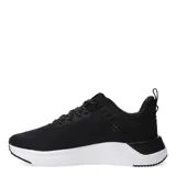 Championes deportivos Puma modelo Softride Astro T, color negro con suela blanca. Presentan parte superior de malla transpirable, logo Puma en el lateral y cordones con detalle moteado.