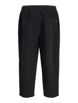 Pantalón gris oscuro de corte holgado, con pinzas en la cintura y estilo relaxed.