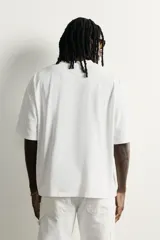 Camiseta de algodón con cuello redondo y mangas cortas, de corte relaxed fit y efecto lavado gris.