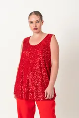 Blusa italiana de paillettes roja, sin mangas y de corte holgado.