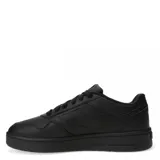Championes Puma Court Classic de cuero sintético negro con detalles dorados, cordones negros y suela plana.