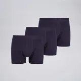 Pack de tres boxers lisos color azul marino con cintura elástica.