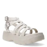 Sandalias franciscanas de cuero con diseño de tiras anchas, cierre con doble hebilla metálica y suela de plataforma track con relieve.