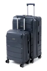 Set de dos valijas r
gidas color gris con ruedas, manija retr
ctil y candado de seguridad. Incluye una valija grande y una valija de cabina.