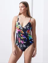 Malla enteriza negra con estampado de hojas de colores, escote en V cruzado y breteles regulables.