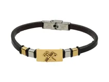 Pulsera de cuero negro con dije dorado de acero inoxidable con diseño de tijeras y peine cruzados.