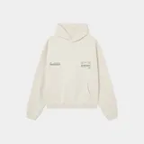 Hoodie de corte oversized color arena, con capucha y bolsillo tipo canguro. Presenta un diseño estampado en la espalda con tres círculos gráficos y texto en color verde.