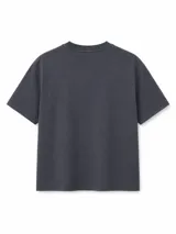 Remera básica de corte holgado, color beige melange, de manga corta y cuello redondo acanalado.