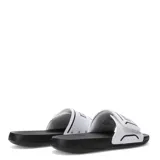 Sandalias tipo ojota Puma modelo Royalcat Comfort 2, con base negra y tira superior blanca con el logo de la marca en negro. Cuenta con tecnología Softride en la suela para mayor comodidad.